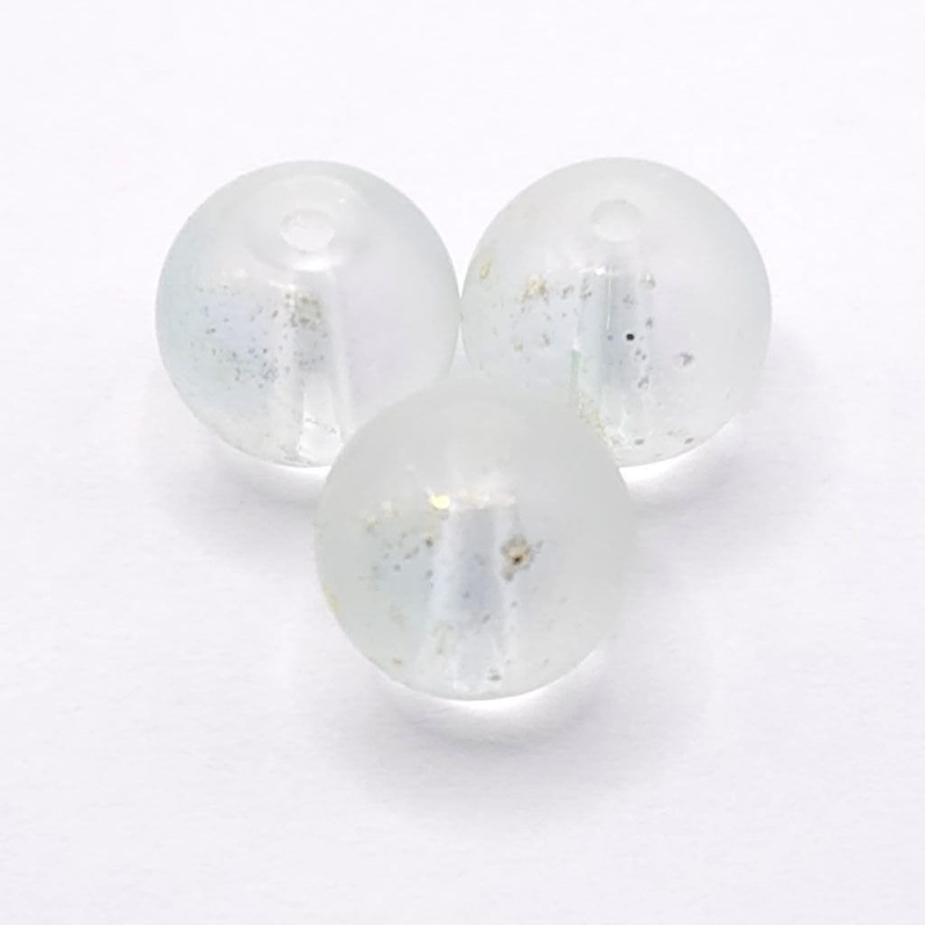 Three round, semi-translucent azure  beads with tiny gold flecks inside, arranged on a plain white background.