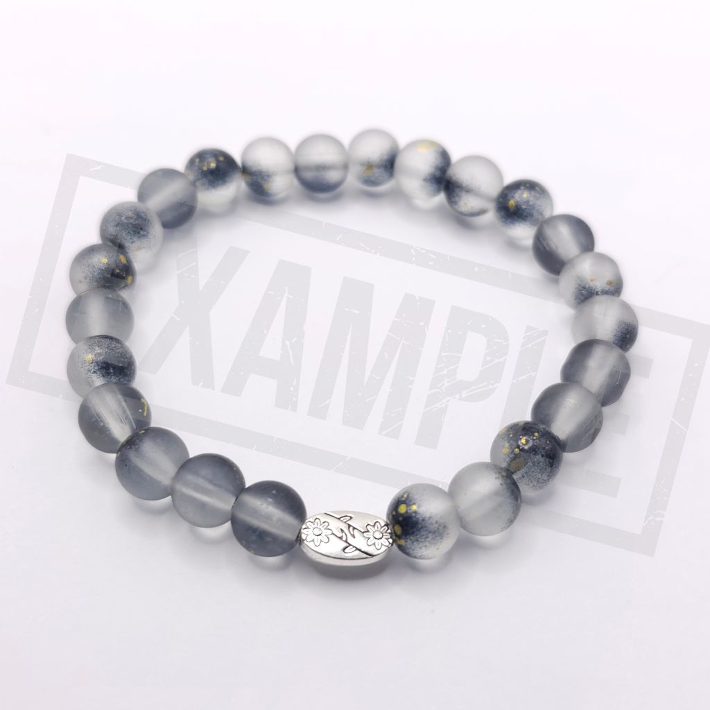 Black frosted glass bead bracelet with a smooth matte finish. Sleek, modern and perfect for elegant handmade jewellery.