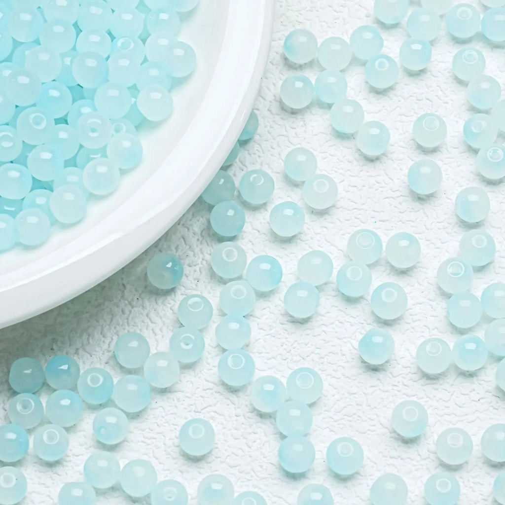 Blue gradient glossy beads with a soft shine. Fresh and perfect for ocean‑inspired handmade jewellery.