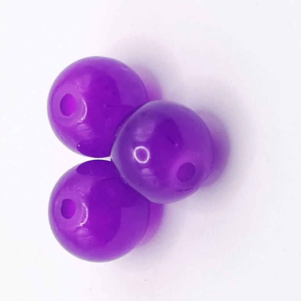 Three glossy crystal purple round beads with central holes, arranged on a plain white background.
