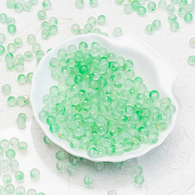 Fruit Green frosted glass beads with a matte finish. Fresh, lively and perfect for colourful handmade jewellery.