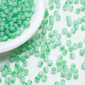 Green‑Blue gradient glossy beads with a soft shine. Fresh and perfect for ocean‑inspired jewellery.