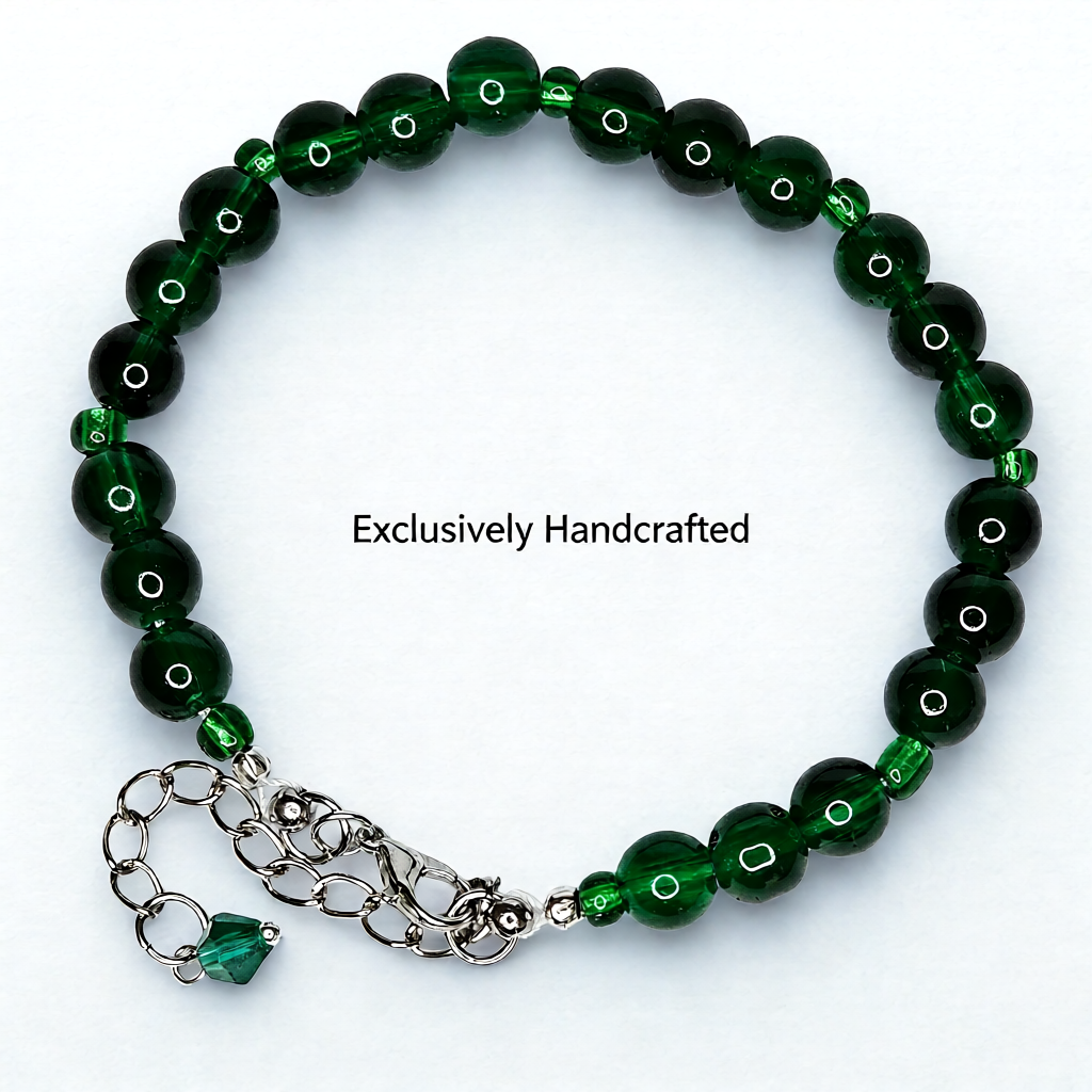 Green beaded bracelet with a silver clasp on a white background