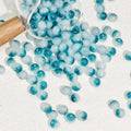Green Hole gradient glossy beads with a soft shine. Fresh and perfect for calming handmade jewellery.