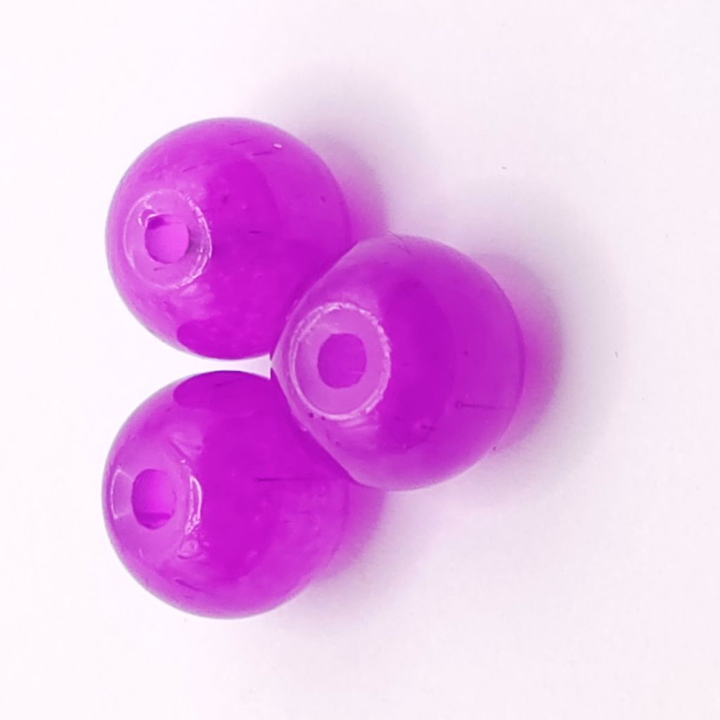 Three translucent light purple glass beads with central holes, arranged in a triangle on a plain white background.