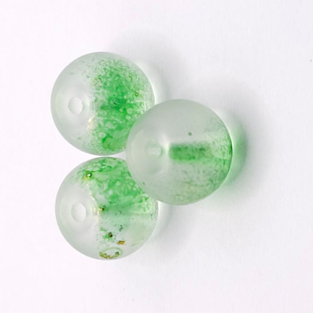 Three round translucent Lime green glass beads with gold foil flecks, arranged on a plain white background.