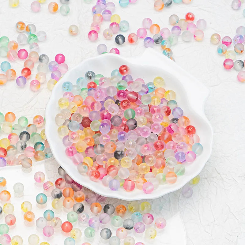 Mixed frosted glass beads with a matte finish. Colourful, modern and perfect for creative handmade jewellery.