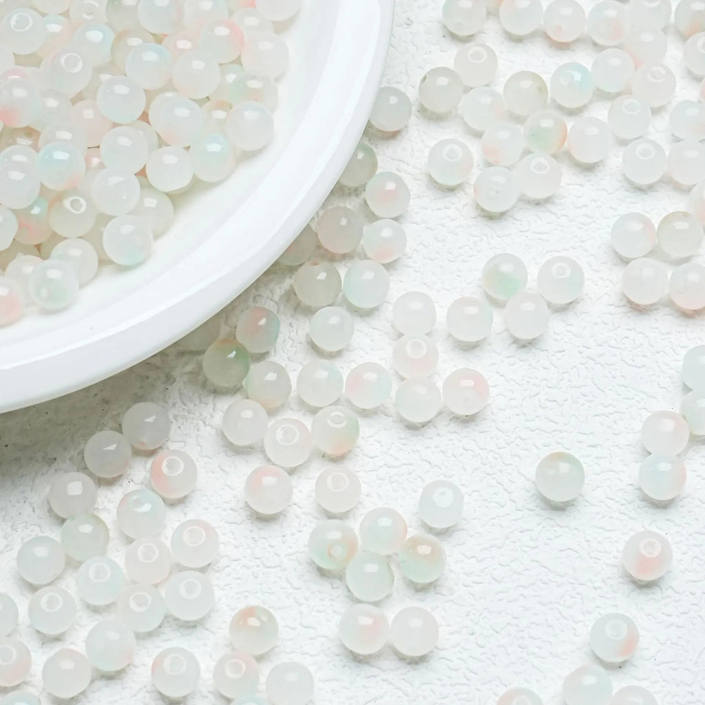 Orange‑Blue gradient glossy beads with a bright shine. Bold and perfect for creative handmade jewellery.