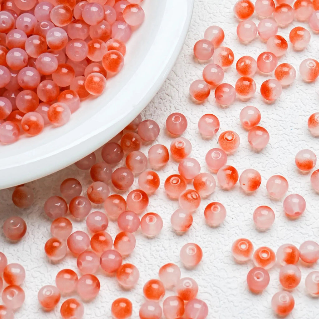 Orange gradient glossy beads with a vibrant shine. Warm, bright and perfect for sunset‑inspired and modern handmade jewellery designs.