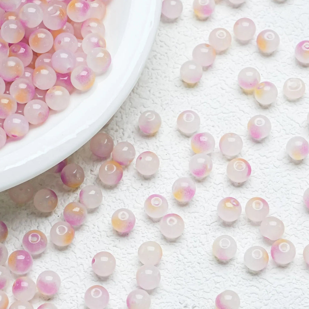 Peach gradient glossy beads with a soft shine. Warm and perfect for feminine handmade jewellery.