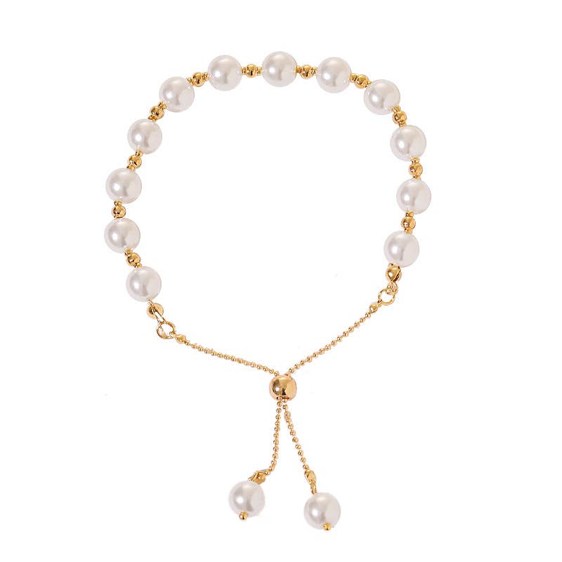 Pearl bracelet with gold chain on a white background