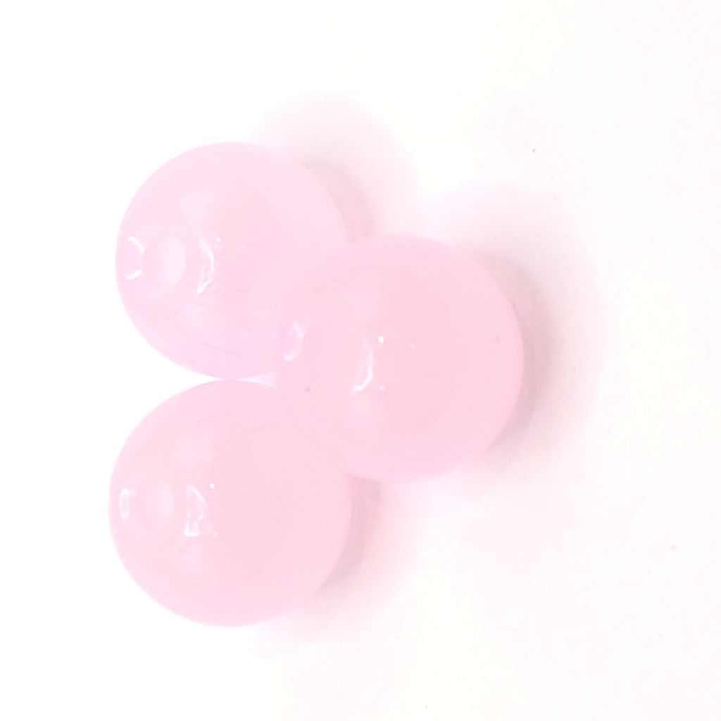 Three glossy light pink round beads arranged in a triangle on a white background.