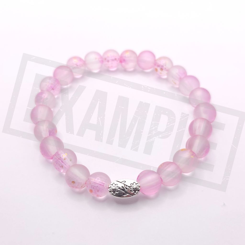 Pink frosted glass bead bracelet with a matte finish. Soft, elegant and perfect for feminine handmade jewellery.