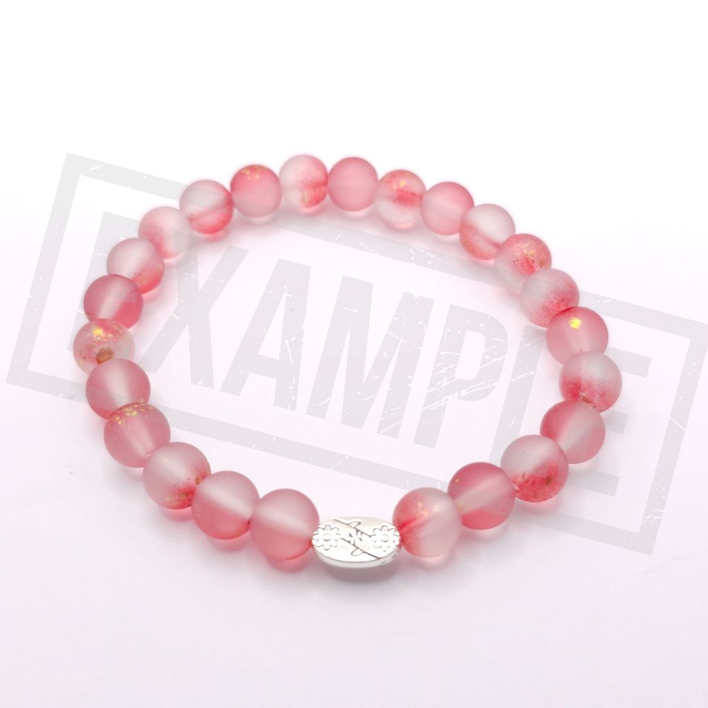 Red frosted glass bead bracelet with a matte finish. Bold, warm and perfect for standout handmade jewellery.