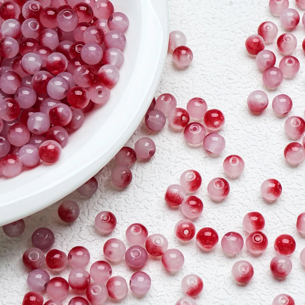 Red gradient glossy beads with a polished shine. Warm, bold and perfect for elegant handmade jewellery.