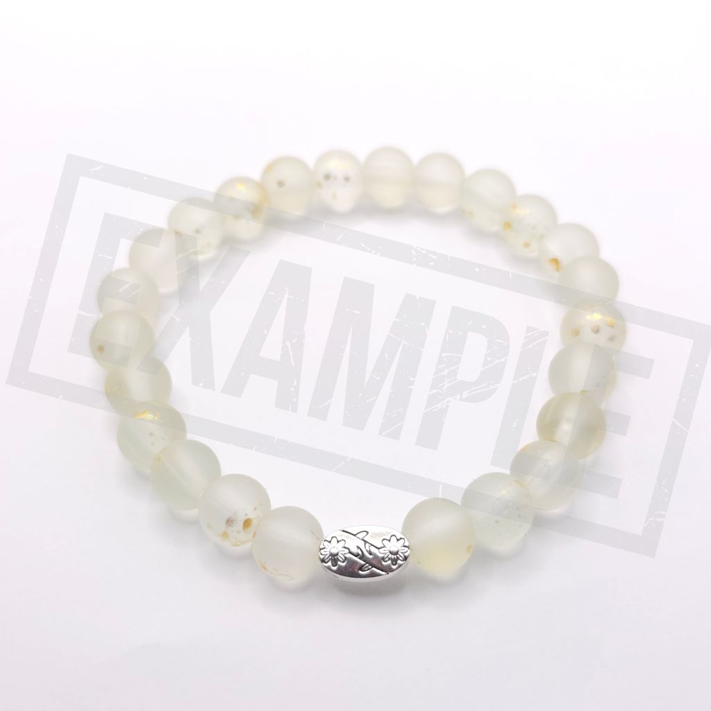 White frosted glass bead bracelet with a matte finish. Clean, elegant and perfect for refined handmade jewellery.