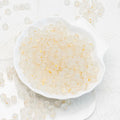 White frosted glass beads with a matte finish. Clean, elegant and perfect for refined handmade jewellery.
