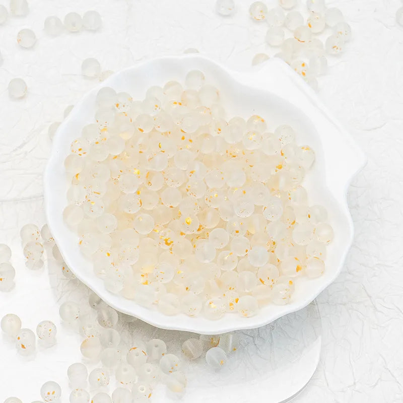 White frosted glass beads with a matte finish. Clean, elegant and perfect for refined handmade jewellery.