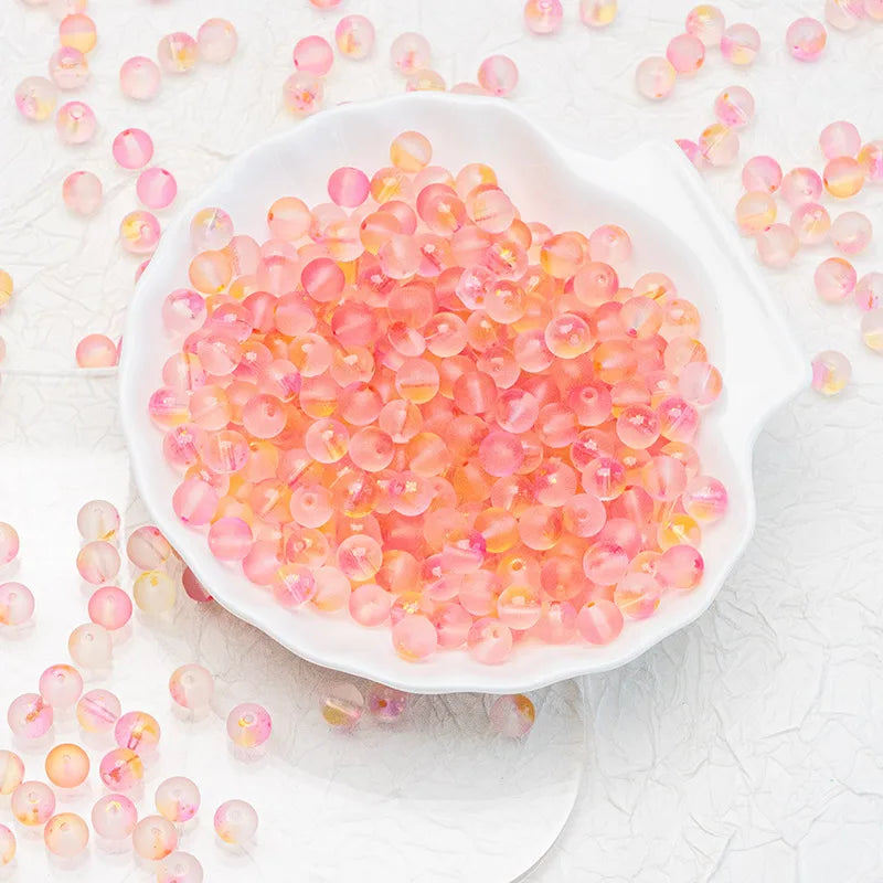 Yellow‑Pink frosted glass beads with a soft matte finish. Colourful, warm and perfect for playful handmade jewellery.